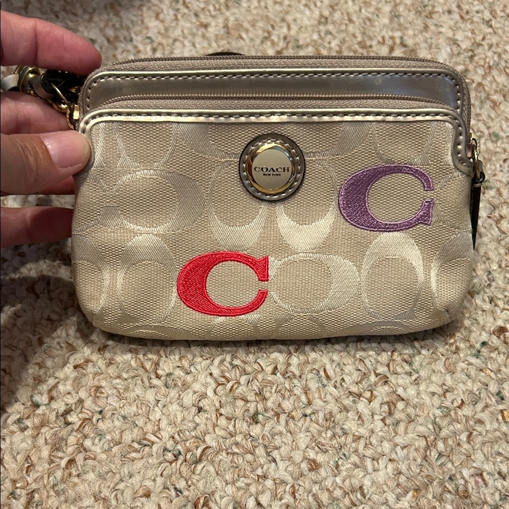 Coach Beige Wristlet with Red and Purple Letters